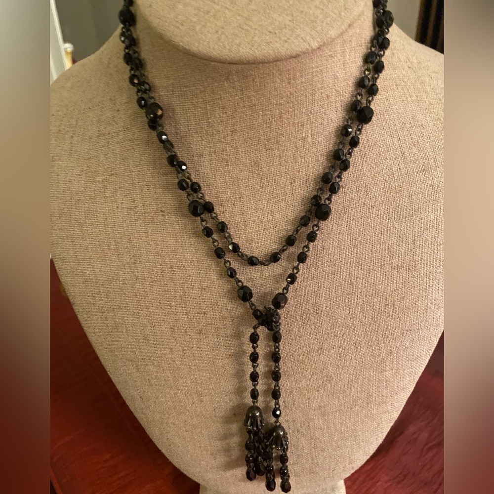 Necklace. Black faceted beads medium and small in size. Wrap around style.